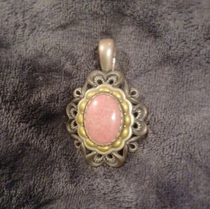 Rhodonite sterling silver and brass enhancer.2 1/2 inches long.1 3/4 inches wide